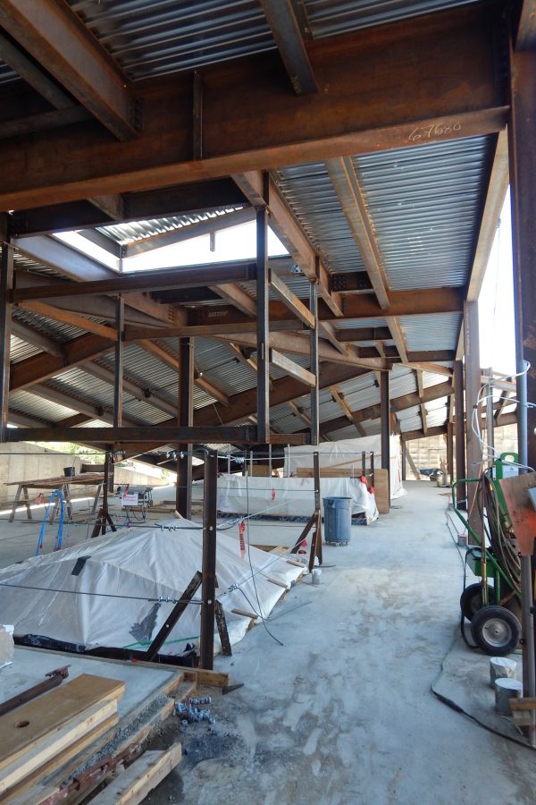 Another June 16 view of the penthouse. The elevator shaft will rise between the tented area and the skylight at left. (Doug Hubley/Bates College)