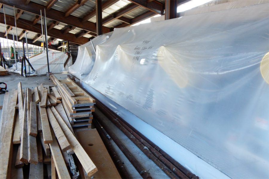 An HVAC exhaust unit recently hoisted to the Bonney center penthouse. The plastic helps keep dust and debris out of the works. (Doug Hubley/Bates College)