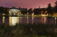 Pettengill Hall seen from across Lake Andrews, "The Puddle," at 8:42 P.M. on May 10th, 2018. Photo was captured using a Canon EOS 5D Mark IV and a 24mm lens, ISO: 125, Aperture: 11, Shutter: 30 seconds.