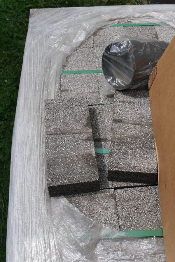 A close view of the asphalt pavers that will be used at Veterans Plaza. (Doug Hubley/Bates College)