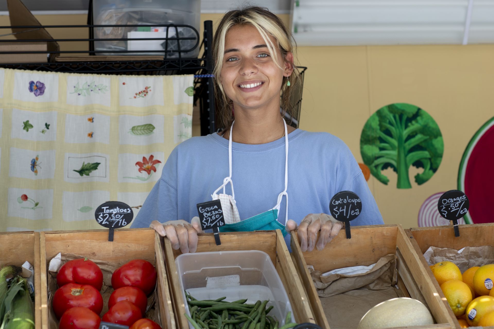 "Living and working in the Lewiston community has taught me a lot about what it really means to invest in the place one calls home because I’ve had the opportunity to work so closely with individuals who have committed themselves to connecting community members to food, land, and each other.”—Religious studies major Anna Maheu ’21 of New York City, photographed on Campus Avenue with the Good Food Bus, a mobile market that brings locally sourced produce to various neighborhoods.Maheu’s Harward Summer Civic Fellowship with the Nutrition Center is funded through the Harward Center for Community Partnerships @harwardcenter.A food security organization for food insecure and otherwise vulnerable families, the Nutrition Center’s integrated programs include urban community gardens, children’s gardening and cooking programs, cooking and nutrition education programs, youth leadership programs, food access initiatives, and a food pantry.Maheu’s work this summer consists of supporting the Nutrition Centers various gardens throughout Lewiston-Auburn, maintaining educational gardens, assisting the food pantry in its efforts to adapt to COVID-19 through food deliveries, and the Good Food Bus.Maheu’s hands-on experience, coupled with support provided by the Nutrition Center’s staff members, has provided her with a “ground-level look at the myriad ways that food justice and access is pursued,” she says, and “has reaffirmed how fundamental food and soil are to the lives we live, the power structures we must work against, and the relationships we cultivate.”Thanks to the Nutrition Center, she also has had the chance to grow much of her own food this summer. “I will take these sustaining and sustainable capacities with me into my life after Bates.”