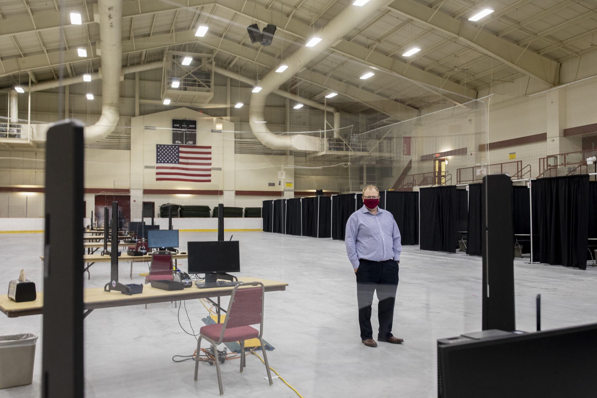 Underhill Arena, where the college will test members of the Bates community for COVID-19, in the process of being set up on Aug. 17, 2020.

Posing for portraits is Assistant Director of Athletics for Athletic Performance Nick Cooke, who Is running the testing center. He and President Clayton  Spencer with Vice President for Campus Life and Dean of Students Josh McIntosh take a tour of the facility which is almost but not entirely set up. Testing for employees begins on Aug. 18, 2020.