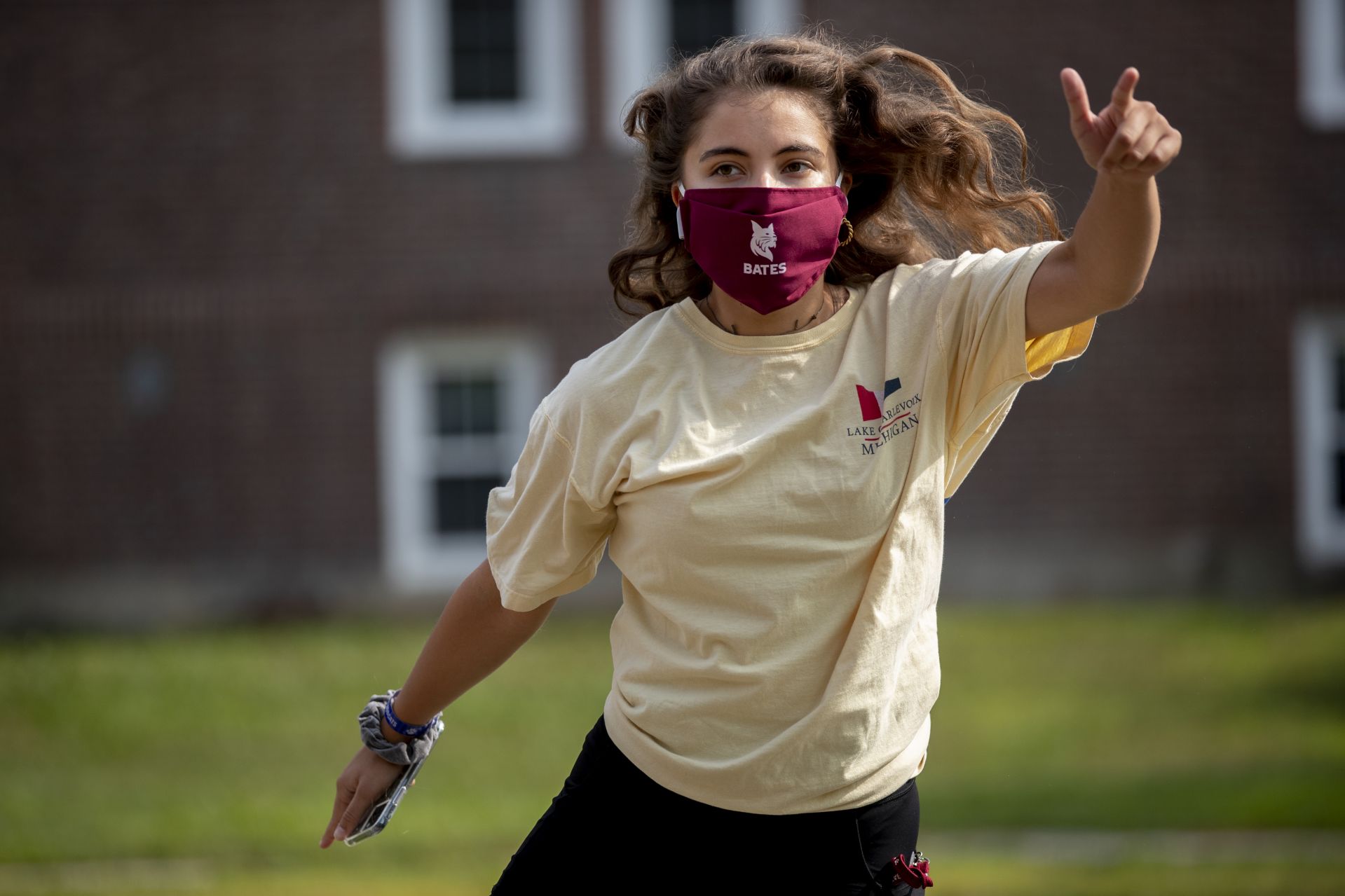 Move-In Day, the first of three successive days, on Aug. 25, 2020. Students start at Underhill for COVID-19 testing, go to Merrill for keys, head to residences, where they wait until based on the wrist bands they received at Underhill, head over to tent adjacent to Garcelon Field for a bagged lunch.

“I’m so happy to be back!”

Walking on Campus Avenue to her Chu Hall residence, OWL (Orientation Week Leader) Katia Ryan ’23 of Amsterdam, N.Y., swings her arms to express her excitement about returning to campus.

Today’s historic student move in was the first of three. Most first-years begin to arrive Wednesday and Thursday.