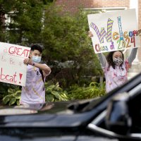 Day two of a three-day move in featured loads of luggage, spirited greetings, and emotional goodbyes. For a small taste of what we saw, swipe left.Walking on Campus Avenue to her Chu Hall residence, OWL (Orientation Week Leader) Katia Ryan ’23 of Amsterdam, N.Y., swings her arms to express her excitement about returning to campus.Today’s historic student move in was the first of three. Most first-years begin to arrive Wednesday and Thursday.