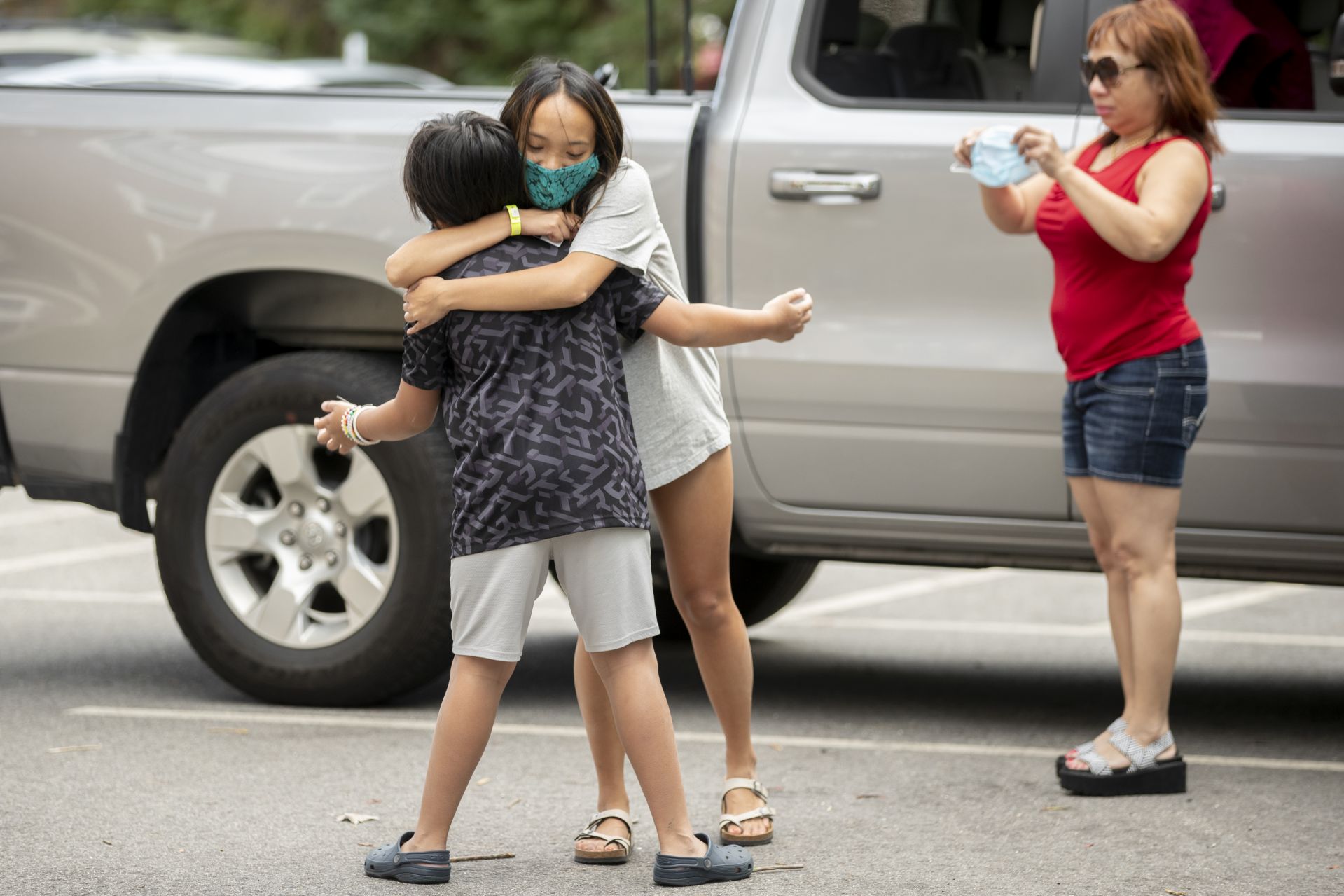 Day two of a three-day move in featured loads of luggage, spirited greetings, and emotional goodbyes. For a small taste of what we saw, swipe left.Walking on Campus Avenue to her Chu Hall residence, OWL (Orientation Week Leader) Katia Ryan ’23 of Amsterdam, N.Y., swings her arms to express her excitement about returning to campus.Today’s historic student move in was the first of three. Most first-years begin to arrive Wednesday and Thursday.