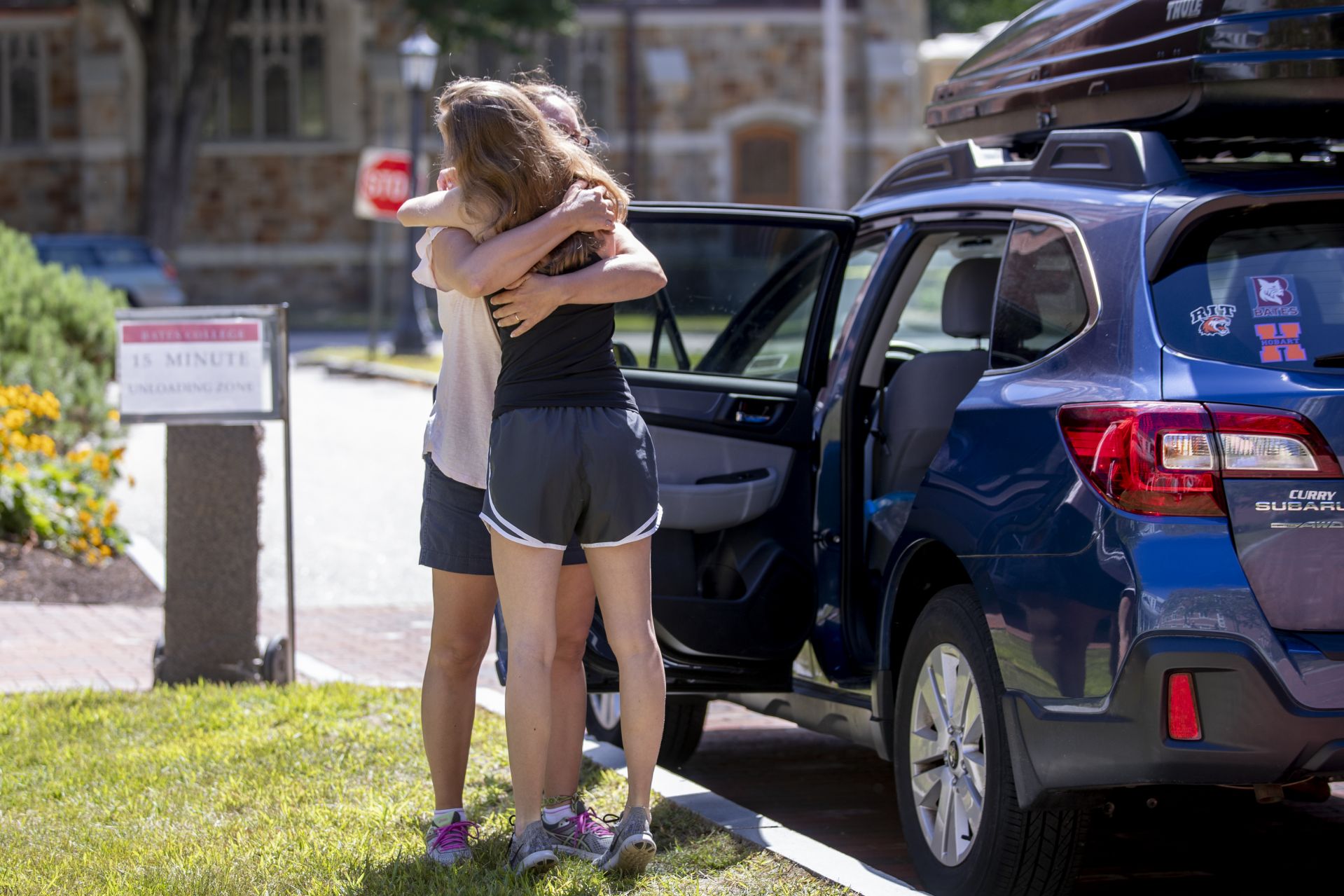 Day two of a three-day move in featured loads of luggage, spirited greetings, and emotional goodbyes. For a small taste of what we saw, swipe left.

Walking on Campus Avenue to her Chu Hall residence, OWL (Orientation Week Leader) Katia Ryan ’23 of Amsterdam, N.Y., swings her arms to express her excitement about returning to campus.

Today’s historic student move in was the first of three. Most first-years begin to arrive Wednesday and Thursday.