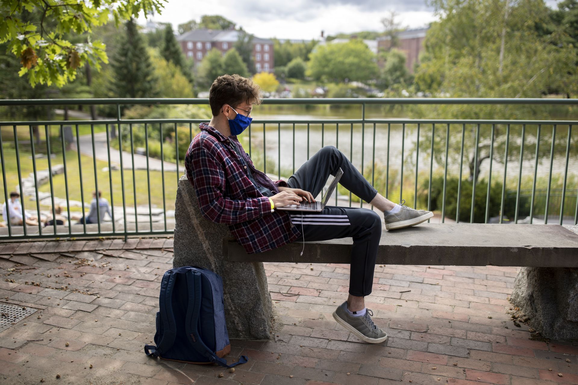 The Bates campus on and around Lake Andrews on Sept. 1, 2020, the day before classes start.


Brian Boitnot ‘21 Hanover, N.H., prepares for classes on the Olin Terrace.