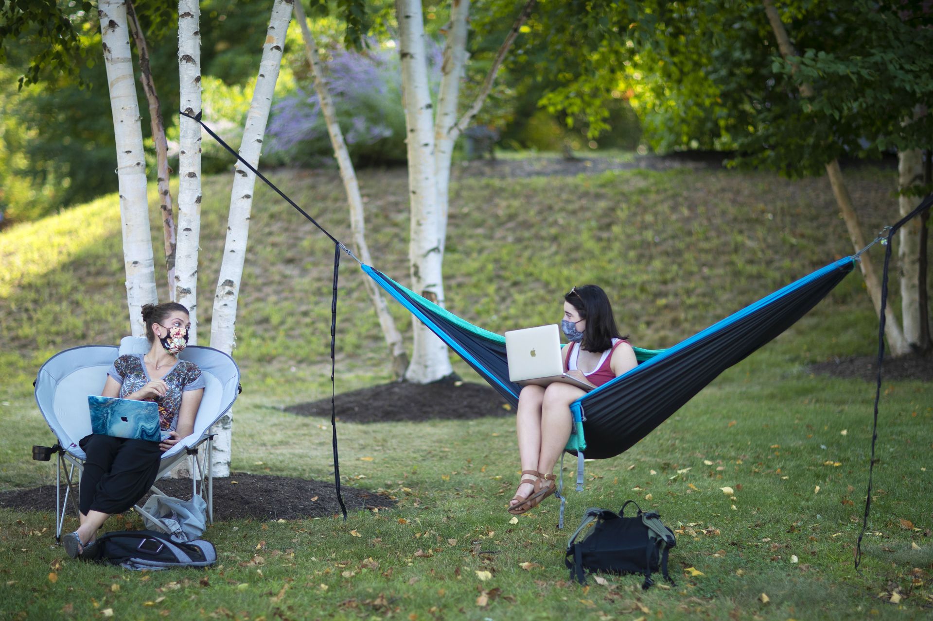 Campus scenes on Sept. 8, 2020.

From left, roomates Svea Althausen ’24 of Reno, Nevada, and Katherine Buetens ’24 of Orono, Maine, enjoy studying outside along Alumni Walk in front of Hathorn Hall.

Althausen likes the camp chair because she can pop it open across campus as she likes – and it’s really comfy, she says. She finds it difficult to study in a hammock because the swaying interferes with her concentration. She was studying for INDS 295 - Afro-diasporic Activism


Buetens received the hammock as a high school graduation gift from her mother. FYS Vaccines taught by Bruno Salazar-Perea