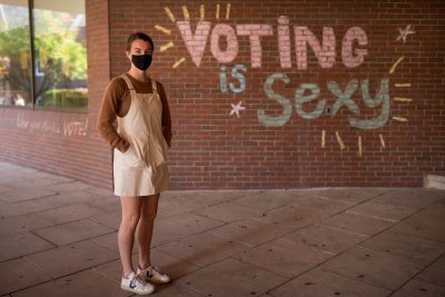 Mary Corcoran '22 Brookline, Mass.SociologyWomen’s Cross Country Track Team and Bates VotesIn the Ladd Library well with voting graffiti posted by Bates Democrats