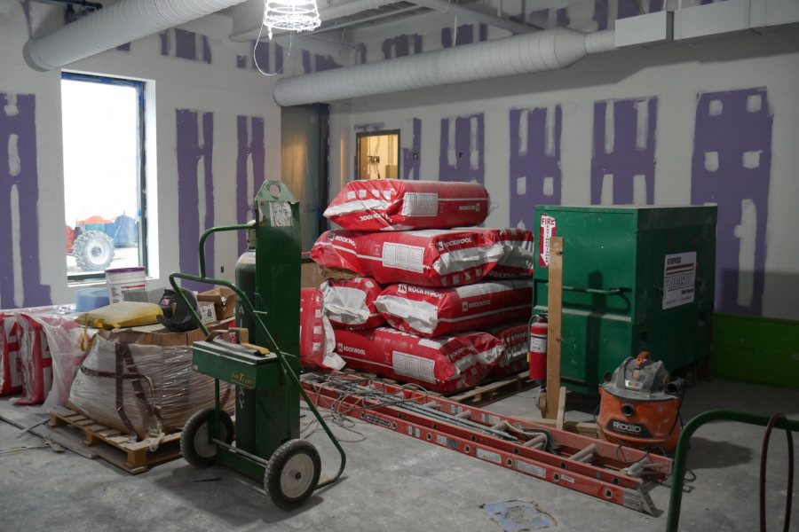 A first-floor classroom in the new science center serves for the moment as a storage area for wall insulation. (Doug Hubley/Bates College)