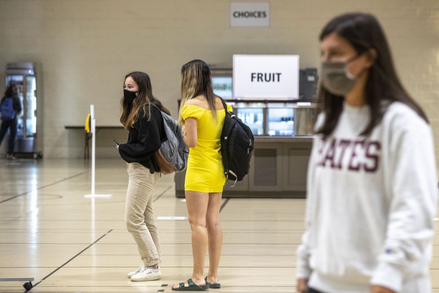 Students arrive at the Clifton Daggett Gray Athletic Building for Dash lunch at noontime on Oct. 5, 2020.