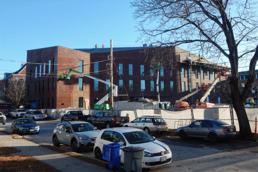 If if weren't for all the lifts bearing workers, this view of the Bonney Science Center's south wall might convince you that the building's about done. (Doug Hubley/Bates College)