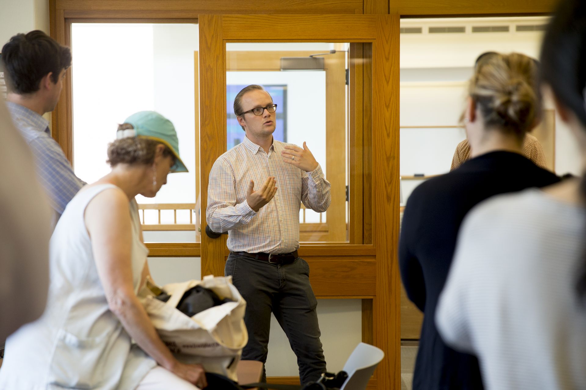 Dan Sanford, director, Writing at Bates and the Academic Resource Commons, leadsthe second of four informal walkthroughs of the Academic Resource Commons from 10am until around 10:30. The space, on the first floor of Ladd Library, is under construction and in development; this is an opportunity to stop by, hear about the program, see what we're up to, and ask any questions that you may have about ARC.  If you can't make it to this one, there are two more to come- walkthroughs are taking at place at 10 every Friday during August.From ARC brochure: "ARC is a community of learners designed to empower Bates students to succeed and excel in their studies. It offers high-quality, student-focused peer tutoring and other support services in a welcoming, inclusive environment. The ARC is a vital part of the academic experience at Bates, complementing the classroom experience with a deeply social, collaborative, interactive learning environment that engages learners of every background in a conversation over shared challenges and student success."Some of Sanford's comments follow."We believe in student leadership. It has to be students leading students.""Depending what's happening here, you'll see the furniture moving around."...emerging best practices for teaching and learning""I am excited about cohort building.""Bates has great student groups."I am really excited for this year's 120 peer tutors.""I'll be telling them, 'You'll put into place systems and practices that will persist for years."