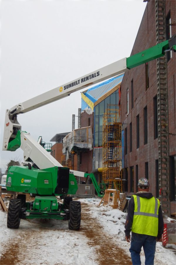 A view along the north wall of the Bonney building on Feb. 15. The "notch," aka the building's main entrance and adjacent glass wall, appears at center. (Doug Hubley/Bates College)