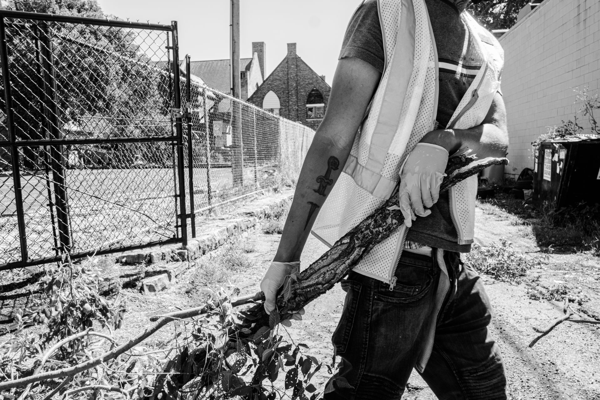 Maafa Redemption participants help clean up West Garfield Park, Chicago’s Westside neighborhood, after a winds had unrooted many of the trees in the area. This is part of the Maafa Redemptions response initiative.