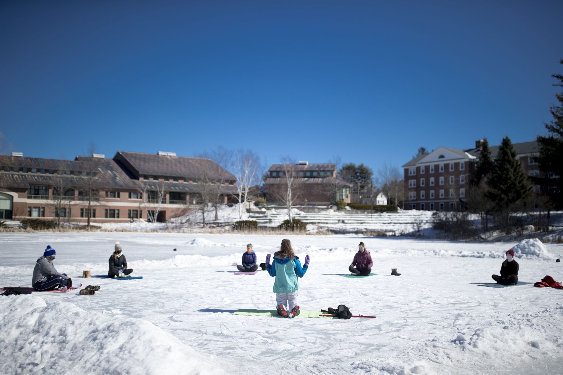 “I think I'm always looking for new perspectives."

Katia Ryan ’23 of Amsterdam, N.Y., leading a group of her fellow Bobcats on a Sunday morning session of Yoga Kula on Lake Andrews.

"You can have the same practice be it on land, ice, water and have a completely different experience," Ryan says. "At Bates we are looking for new ways to connect to the campus we love, and sometimes all you need to do to re-connect is find a fresh perspective: a new way of looking at the experience.”

Brooks Clement (in gray sweatshirt, dark hat), Kerry Manuel, Emma Proietti, Amelia Keleher, Anna Mangum. 