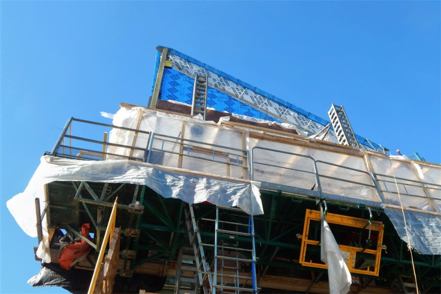 The blueskin-clad peak at the corner of Bardwell Street and Campus Avenue is one of the last expanses of Bonney Center wall that need to be bricked over. (Doug Hubley/Bates College)