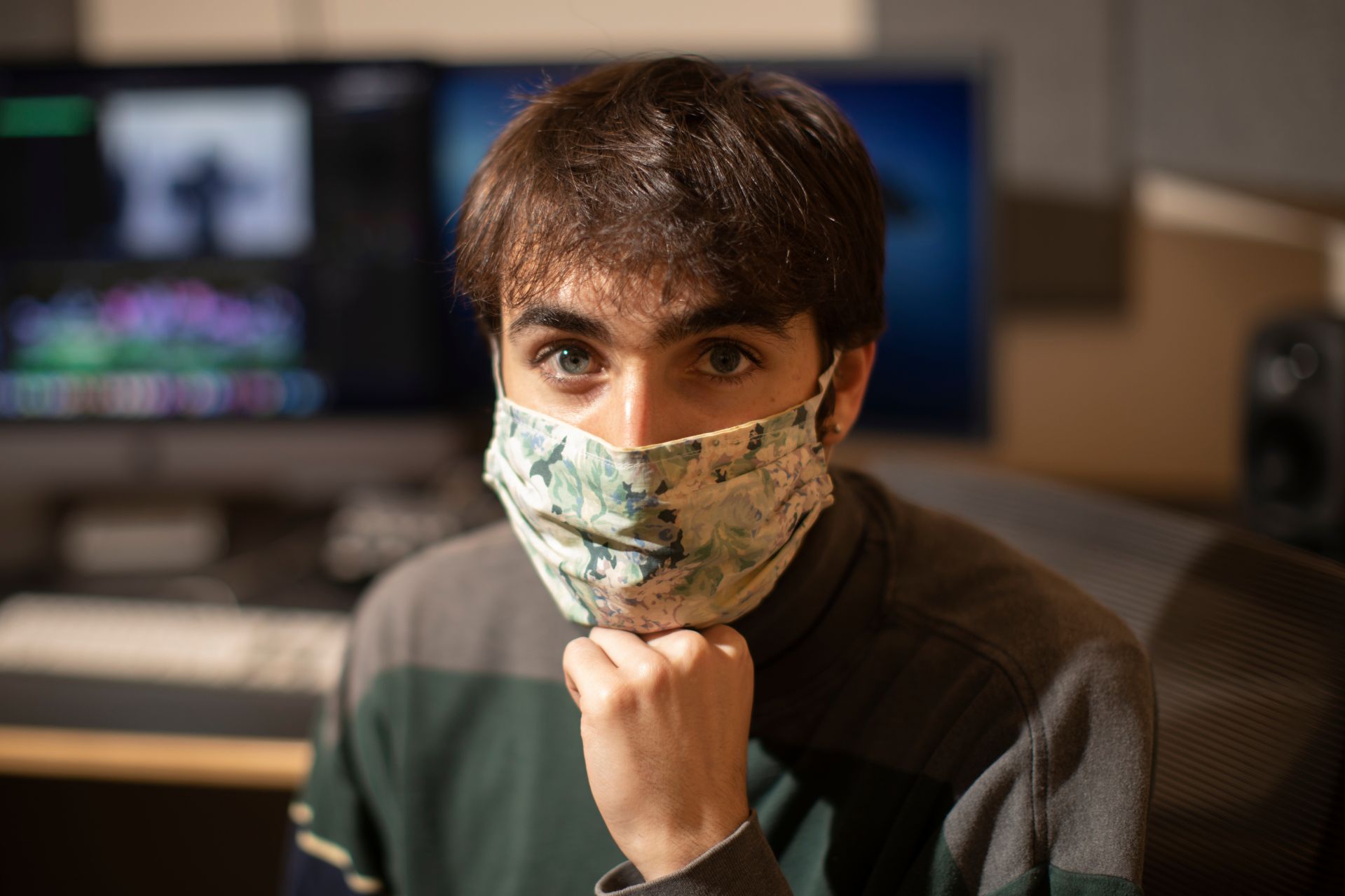 Eli Eshaghpour ‘21 of New York City poses in an editing suite in Pettigrew Hall. A studio art major, he is working on a thesis film about his family’s history as Persian Jews. ____________________"But at Least We Remember"