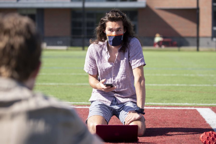 Christopher Barker ‘21 opens the launch sequence document an hour before launch to notify FAA that the launch is on schedule. (Phyllis Graber Jensen/Bates College)