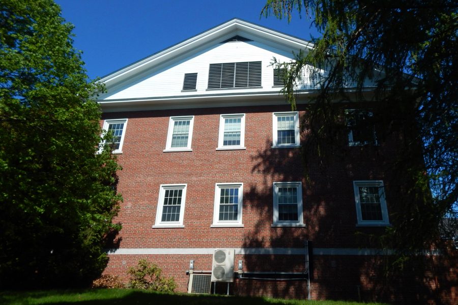 This wall of Dana Chemistry Hall faces Hedge Hall. Currently a busy pathway between the Historic Quad and Alumni Walk, this area will be a hotspot for the Dana renovation and will be closed off. An early chore will be the removal of HVAC and other machinery through the gable. (Doug Hubley/Bates College)