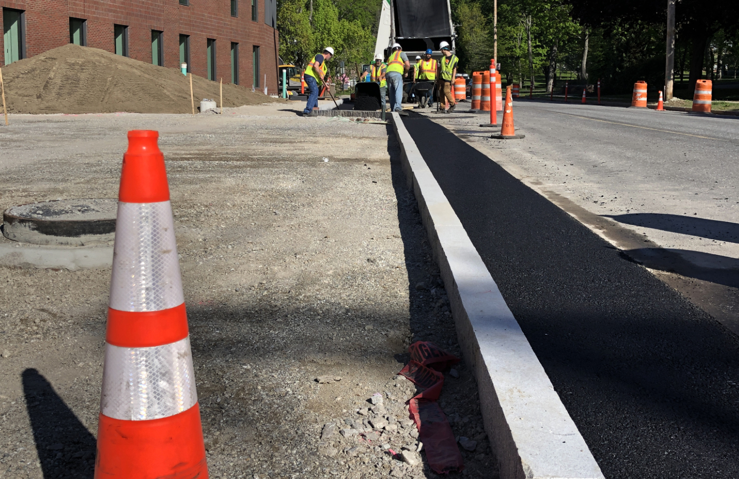 Contractor Gendron & Gendron sets curbing along the Bonney Science Center's Campus Avenue frontage. (Jay Burns/Bates College)