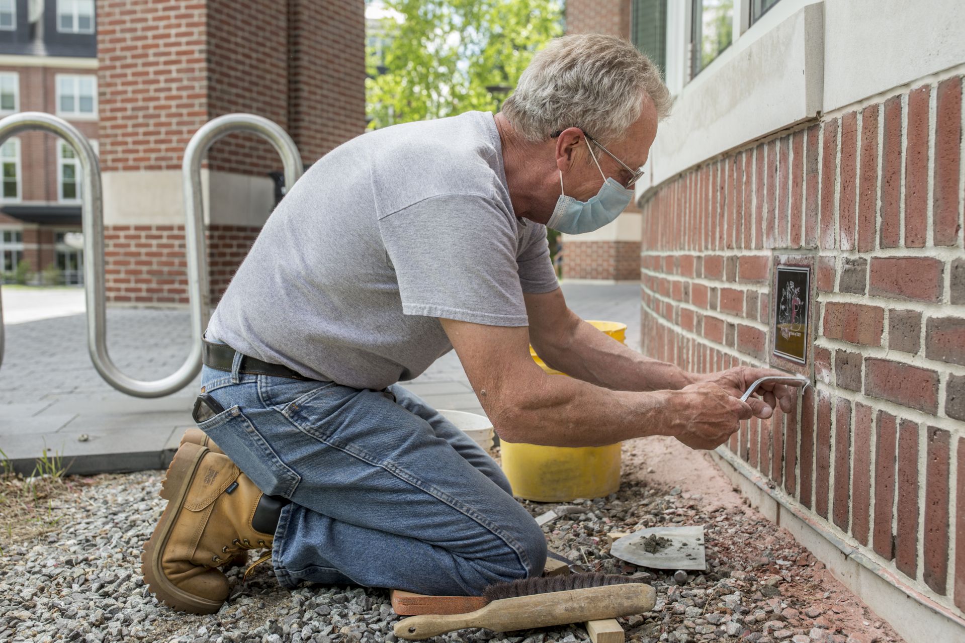 Muskan VermaÊ'21 of Shimla, India, designed the Class of 2021 Ivy Stone that Bates mason Ron Tardif installed to the right of the front door entrance to Pettengill Hall.