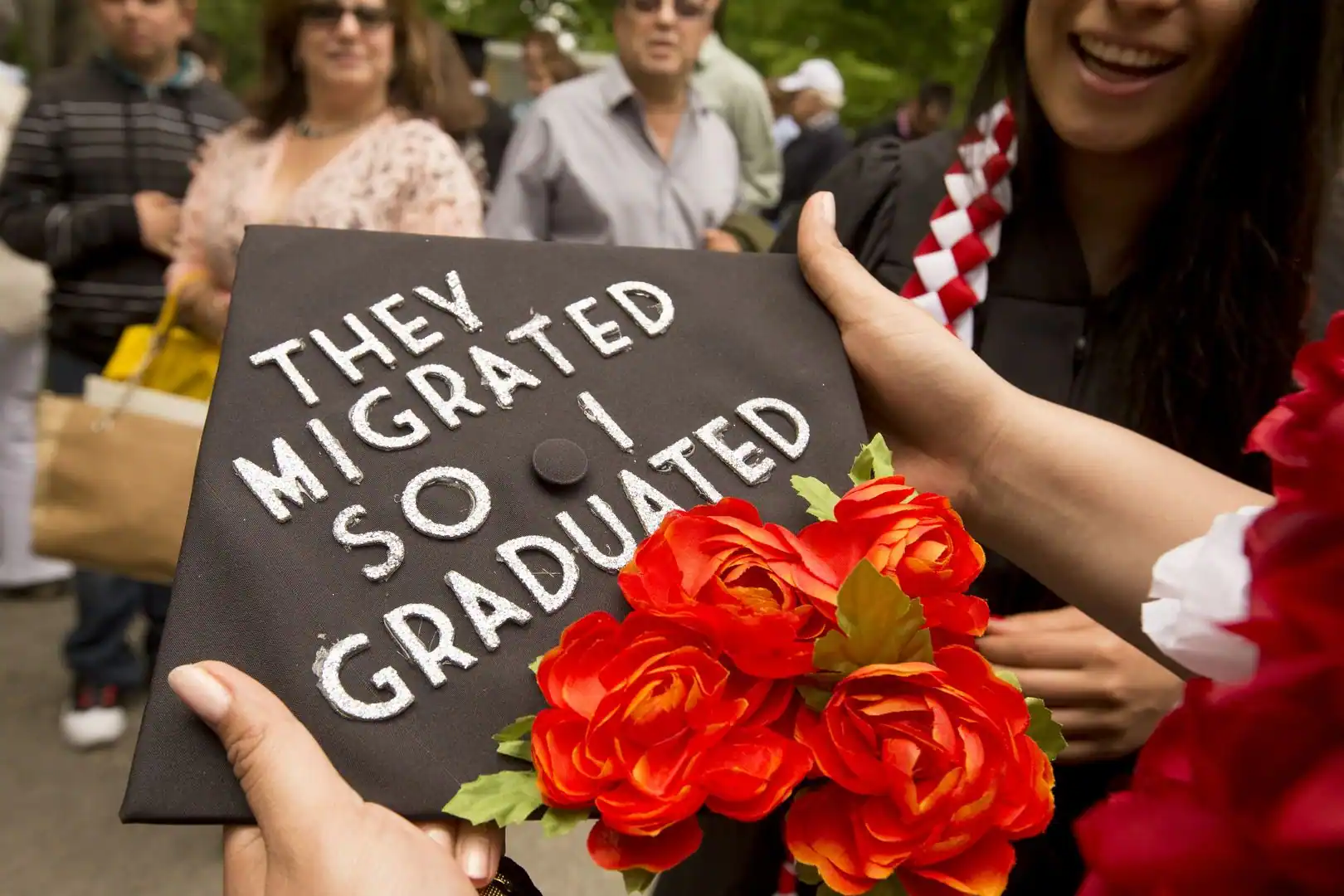 Yessenia Saucedo ’16 of Los Angelos holds her mortarboard after the ceremony. (Phyllis Graber Jensen/Bates College)