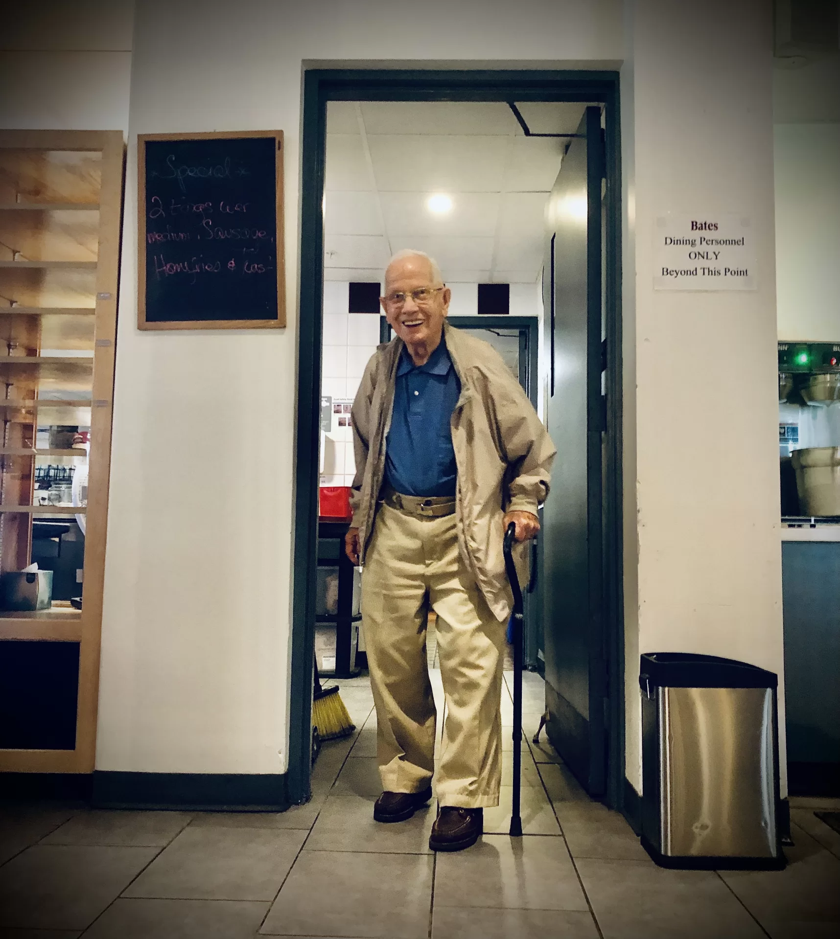 Shortly after the Bobcat Dens' 8 a.m. reopening on Aug. 17, Ralph Sylvester '50 arrives for breakfast, a routine restarted after being disrupted by the closure of the Den in March 2020 due to the pandemic. (H. Jay Burns/Bates College)
