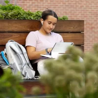 Stella Younkin ’24 of East Greenwich, R.I., reads on the Library Terrace for the course “Lives in Place” taught by Assistant Professor of Environmental Studies Tyler Harper.“I declare after all there is no enjoyment like reading! How much sooner one tires of any thing than of a book!”― Jane Austen, "Pride and Prejudice"Ellory Kearns '24 of Steamboat Springs, Colo., reads Jane Austen's "Sense and Sensibility" on the stops of Coram Library for a course called "Jane Austen: Then and Now" taught by Professor of English Lillian Nayder.Swipe left to see a few scenes of other students reading — and writing — this afternoon throughout campus.