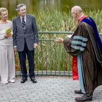 Bill Tucker ’66 and his wife of 31 years, Monica Drozd renew their vows at the Keigwin Amphitheatre on Friday, Sept. 24, in a ceremony officiated by Tucker’s classmate Bill Hiss ’66 and witnessed by Leadership Gift Officers Cary Gemmer Blake ’07 and Rebecca Lazure, both of Advancement. Also present was Colleen Quint ’86 and BCO writer Jen Wright.Hiss writes: “Bill and I had adjoining rooms in what is now Turner House in 1965-6, and have been clise friends ever since. Bill’s Bates story is a fascinating and very unconventional one…He first arrived in the late 1950’s, and with 4 years in between of active duty as an Army MP, finished in 1967. He then set a speed record for a Princeton Ph.D. In psychometrics, and moved into Camden, NJ, where he spent his entire career as a Psychology prof at Rutgers Camden. He wrote some masterful scholarly books both on the use of testing (an interest we have shared for decades), and on the hidden work of truly nasty right-wing foundations. To say that Bill has a lifelong commitment to racial and social justice is a big understatement.”“His Bates and family story is powerfully American: his paternal grandfather deserted from the Czar’s army as a Jewish conscript and walked from the Caucasus to Rotterdam to get a boat to America. His mother’s family, Viennese Jewish intellectuals, got out of Austria barely ahead of the Gestapo. Bill’s use of his Bates education has been masterful, and his philanthropic support goes to issues of racial justice, including some quiet support of bringing minority students from Camden to see Bates.”