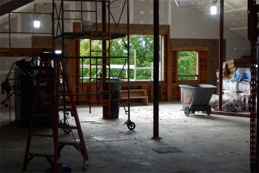 A view toward Hedge Hall from the Dana attic. Staging is in place for utility rough-ins. (Doug Hubley/Bates College)