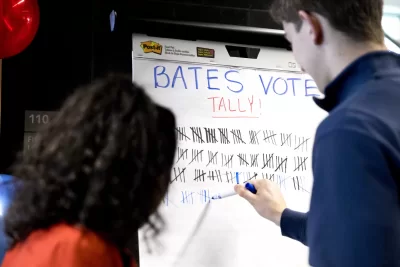 In an effort spearheaded by Bates Democrats, Bates Republicans, and the Harward Center for Community Partnerships, Bates students led a bipartisan effort to get out the vote. Volunteers led walking groups from Commons on the hour and every 15 minutes during peak times to the Lewiston Armory on Central Avenue.In red blazer, Maya Seshan '20 , president of Bates Democrats, of Wilton, Conn.