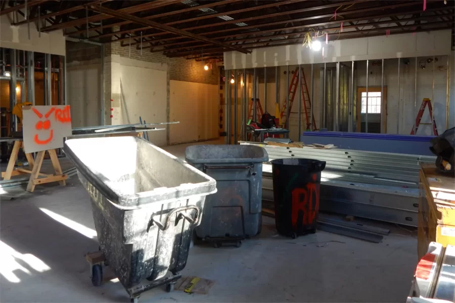 "RD" stands for Roland's Drywall Inc., the local firm building new partition walls in Dana. This sunlit scene is a second-floor classroom. (Doug Hubley/Bates College)