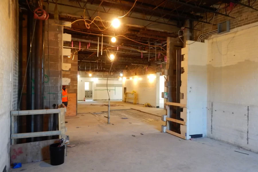 In a visual echo of the Bonney Science Center aesthetic, windows or glass walls will afford transparency to student lounges in Dana Hall. This third-floor image shows the future site of one such lounge, slightly left of center. The photograph was taken in another. (Doug Hubley/Bates College)