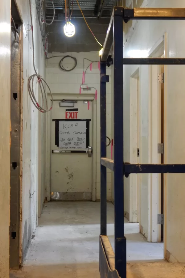 This hallway provides a sense of the "old Dana" and its confined spaces. Offices will be created along the right side and an administrative room at left. (Doug Hubley/Bates College)