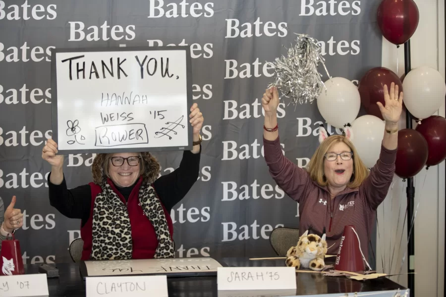 President Clayton Spencer, joined by Vice President of College Advancement Sarah Pearson ‘75 (right) and Director of Alumni and Family Engagement Cary Gemmer '07 (left), kicks off the ever-popular #BatesGreatDay Livestream featuring Bates faculty, amazing a cappella, a special live-edition of the Bobcast, and of course, live donor thank-yous.
.
President Spencer’s sign expressed gratitude for those helping Bates achieve its goal of reaching 1,855 gifts by midnight tonight.