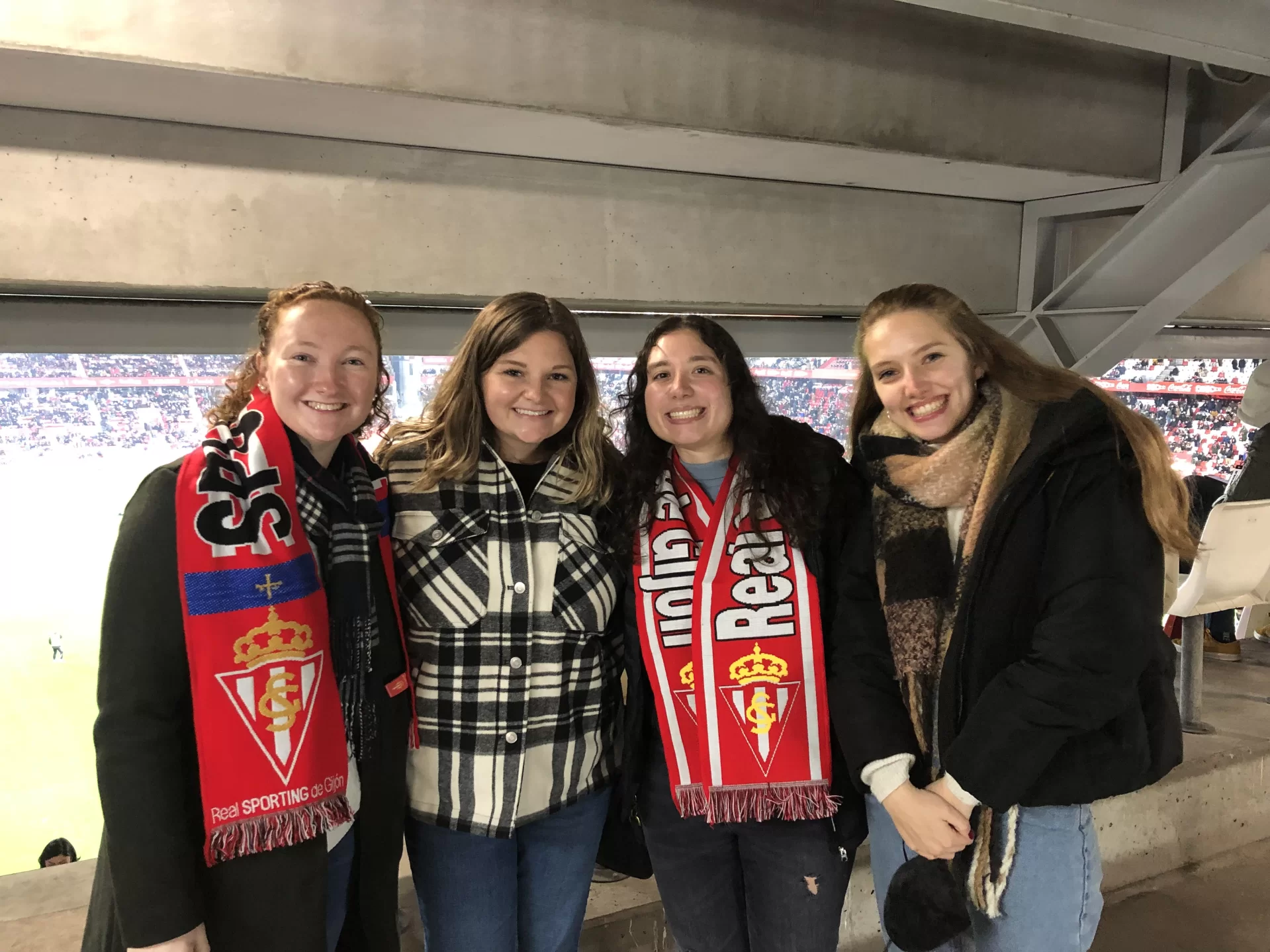 Julia Maluf '21, second from right, attends a Real Sporting de Gijón soccer game with past and current Fulbright scholars, at Estadio Municipal El Molinón-Enrique Castro "Quini", in Asturias, Spain. (Julia Maluf)