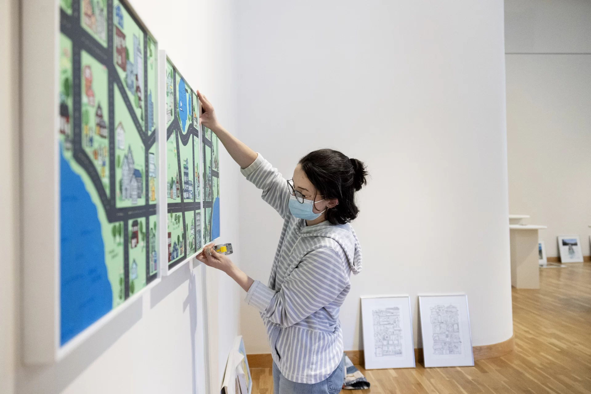Museum of Art on April 11, 2022, during installation of annual senior exhibition.

Katy Boehm, Town Map Triptych, Acrylic Paint and Oil Paint Marker, 20” x 16”