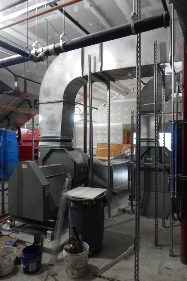 The darker gray contraptions are HVAC exhaust fans newly installed in Dana’s attic. (Doug Hubley/Bates College)