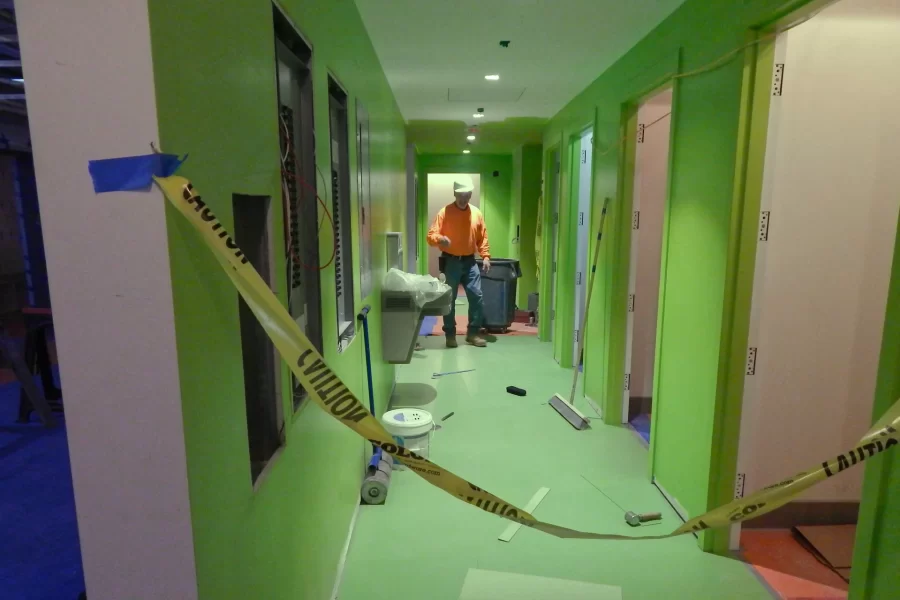 Payette green is the color of some walls and flooring in and around Dana Hall restrooms. This is the first floor. (Doug Hubley/Bates College)