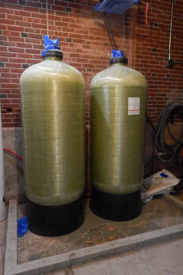 These canisters hold sand that will filter the water supply into Dana Hall. (Doug Hubley/Bates College)