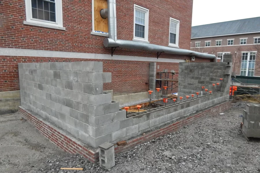 This rain-blurred photo shows where a chiller for the Dana Hall HVAC system will be placed in the coming weeks. (Doug Hubley/Bates College)