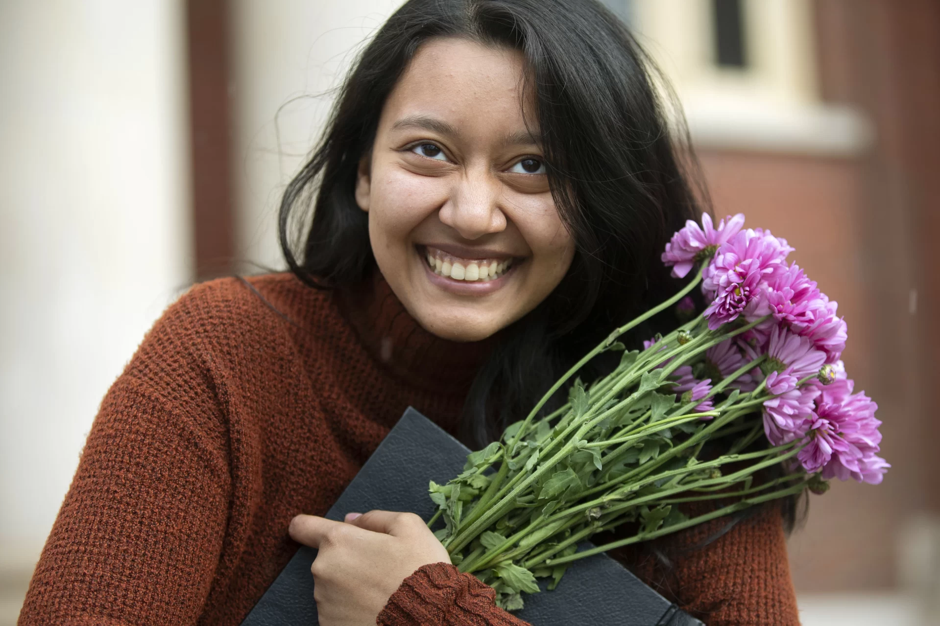 Thesis binding is often a celebration of academic achievement in the company of close friends.

Seniors Julia Henderson, Kayta Tsemo, Isabella David, Ognyan Simeonov, Devanshi Trivedi, and Mathieu Moutou demonstrated the joys of the ritual on the Historic Quad on Friday afternoon, April 22, 2022.