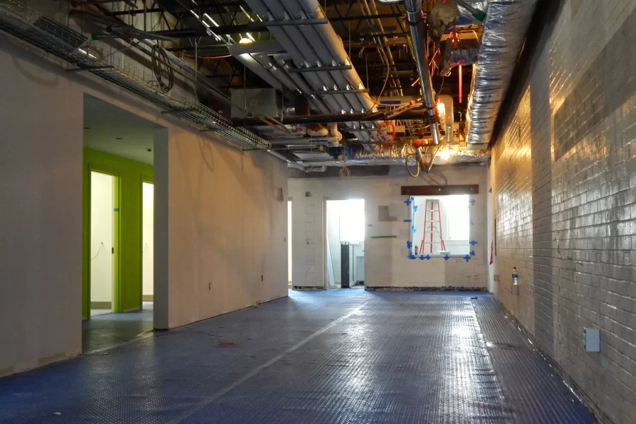 Dana Hall's third-floor lobby. Rest rooms are situated at the left and a student "write-up room" is ahead. (Doug Hubley/Bates College)