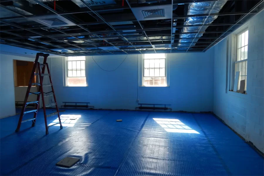 Blue room: A temporary cover protecting new flooring casts blue light in a third-floor Dana Hall classroom. (Doug Hubley/Bates College)