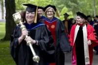 President Spencer follows the college’s mace bearer, Professor of French and Francophone Studies Mary Rice-DeFosse, during the academic procession for the Class of 2020’s long-awaited in-person graduation celebration on June 4, 2022. (Phyllis Graber Jensen/Bates College) 