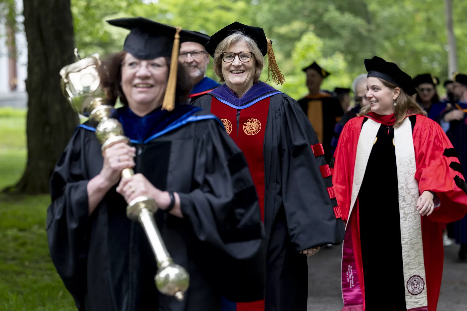 President Spencer follows the college’s mace bearer, Professor of French and Francophone Studies Mary Rice-DeFosse, during the academic procession for the Class of 2020’s long-awaited in-person graduation celebration on June 4, 2022. (Phyllis Graber Jensen/Bates College) 