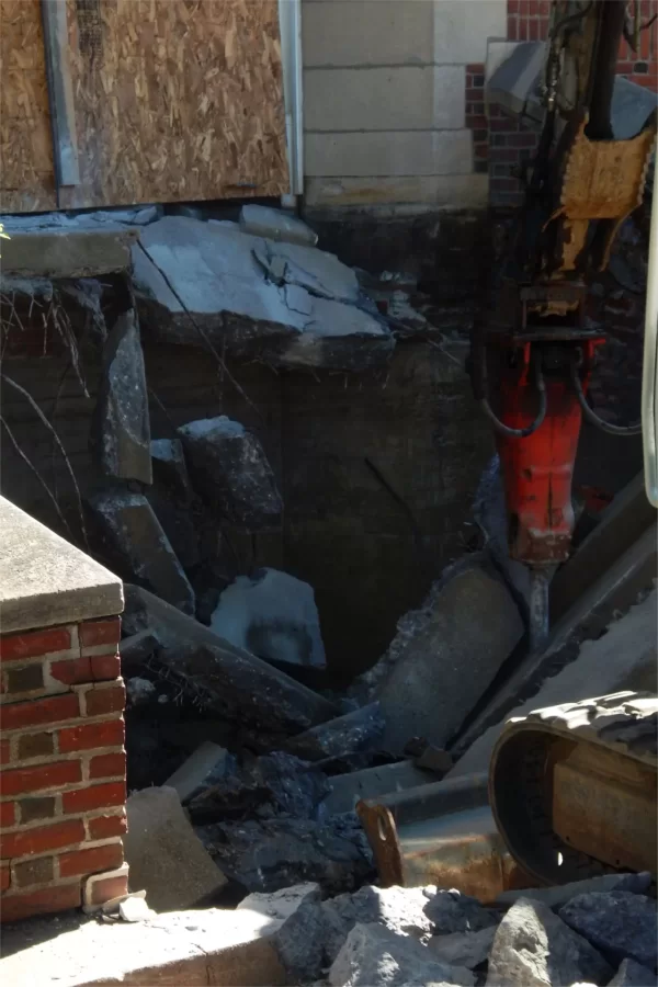 Chase Hall's front steps were no match for a pneumatic hammer. (Doug Hubley/Bates College)