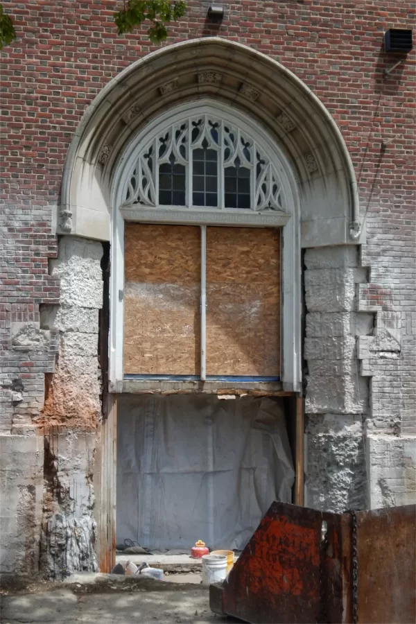 Watch your step: Chase Hall’s main Campus Avenue entrance, bereft of stairs. The entrance will be rebuilt at ground level. (Doug Hubley/Bates College)