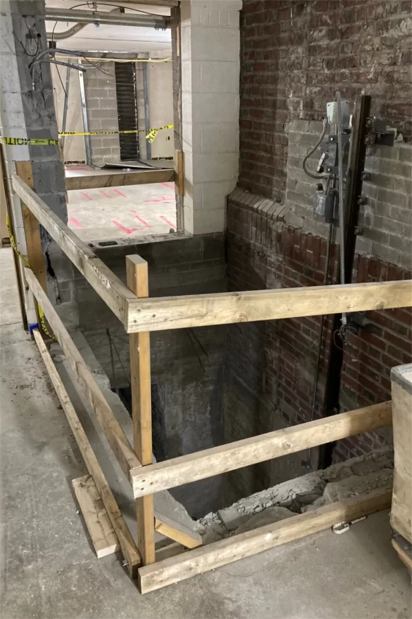 Shown near the former Dining Services loading dock is the shaft and some components of a dumbwaiter that was installed to lift meals upstairs to dining areas, but was also used to lower deliveries to the college store, one flight down. (Doug Hubley/Bates College)